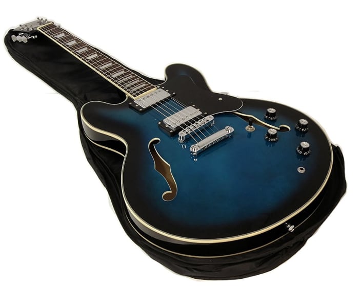 The Benson ES Double Cutaway is available in a number of finishes, including "Ocean Blueburst", shown above.