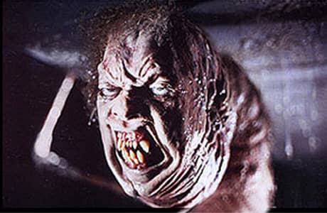 One of many faces the Thing takes to tear apart the camp. It is these graphic images that really set the tone for what may be the scariest movie of all time.