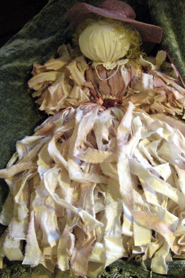 To make one like this, first tear cotton fabric into strips (an old sheet would work).