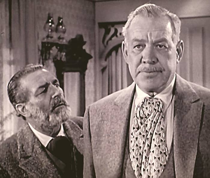 Frank McGrath (left) and Ward Bond. Notice the contrast in their faces. McGrath was "Charlie Wooster" and Bond was "Major Seth Adams" on Wagon Train.