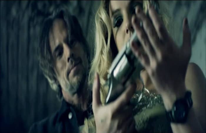 In the aftermath of riots in London, Britney Spears shot er music video there and received criticisms for gripping a gun which is said to glamorize violence.