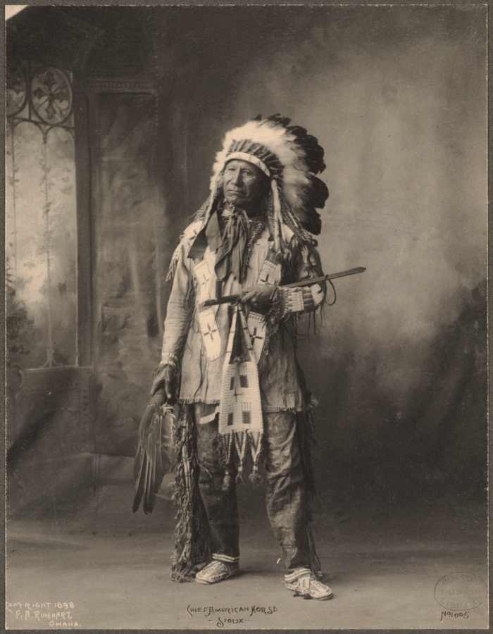 1898 - A Sioux Indian leader in traditional dress.