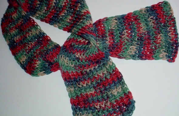 Eight wrap scarf done in a single strand of medium weight yarn. The multicolor yarn in this photo reminds me of jelly bean colors. So, I named this the "jelly bean" scarf. It looks great in the spring with a denim jacket.