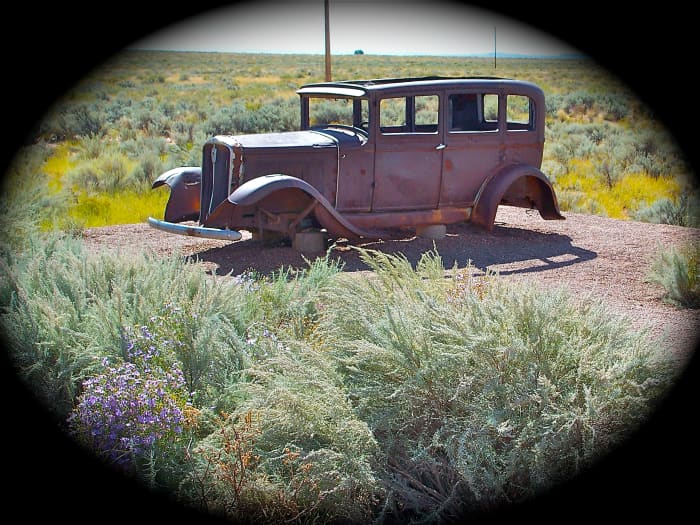 This car was abandoned along old Route 66 near the Petrified Forest in Arizona. They were probably collectors of petrified wood.