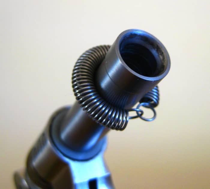 As the jaws are pulled into the funnel shaped opening of the tube, they are forced tightly together to hold the hook.