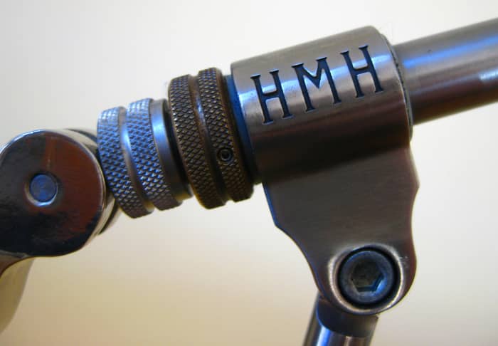 The large allen head set screw allows the tension that holds the vise head angle to be adjusted. It is generally tensioned to the point that it is firm, and yet can be changed without the use of the allen key.
