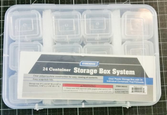 Storage containers with multiple sections are an efficient way to store embellishments. You can do them by color or product type. They can be stacked on a shelf or stored in a draw