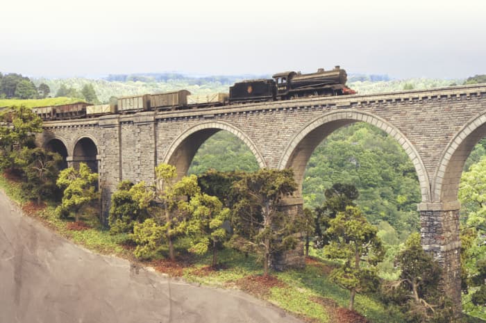 A 'pick-up', branch goods train hauled by LNER Gresley Class J39 returns to Haltwhisle from Alston along branch lines long since ripped up, including this one.