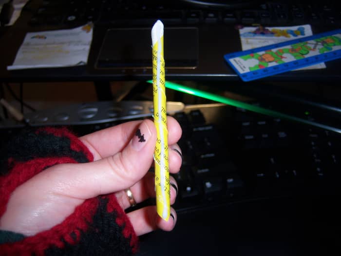 This is how much glue I used on each roll. You don't need much for it to hold well to the can.