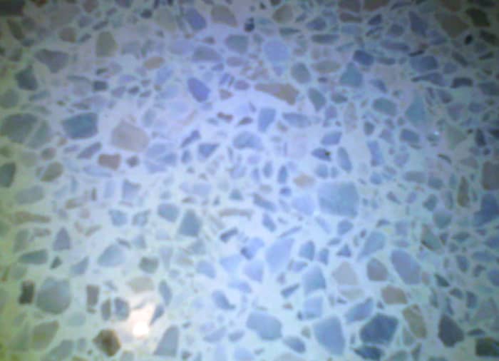 My terrazzo has flecks of light slate blue and bits of carmel against a very white background.
