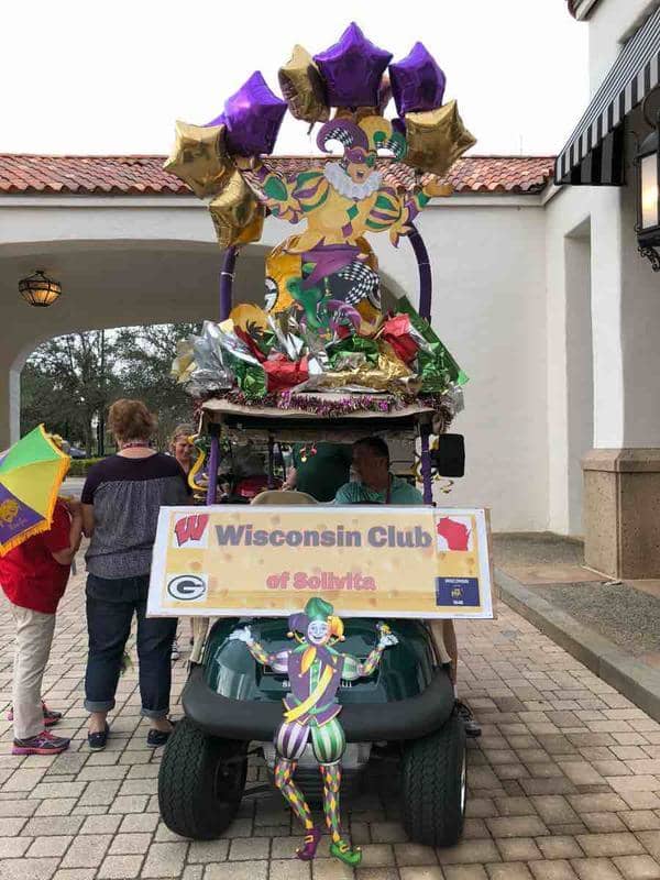 Elaborate decorations for the Mardi Gras parade in Solivita 2018. Creating an arch above the cart roof gives extra dimension to this one.