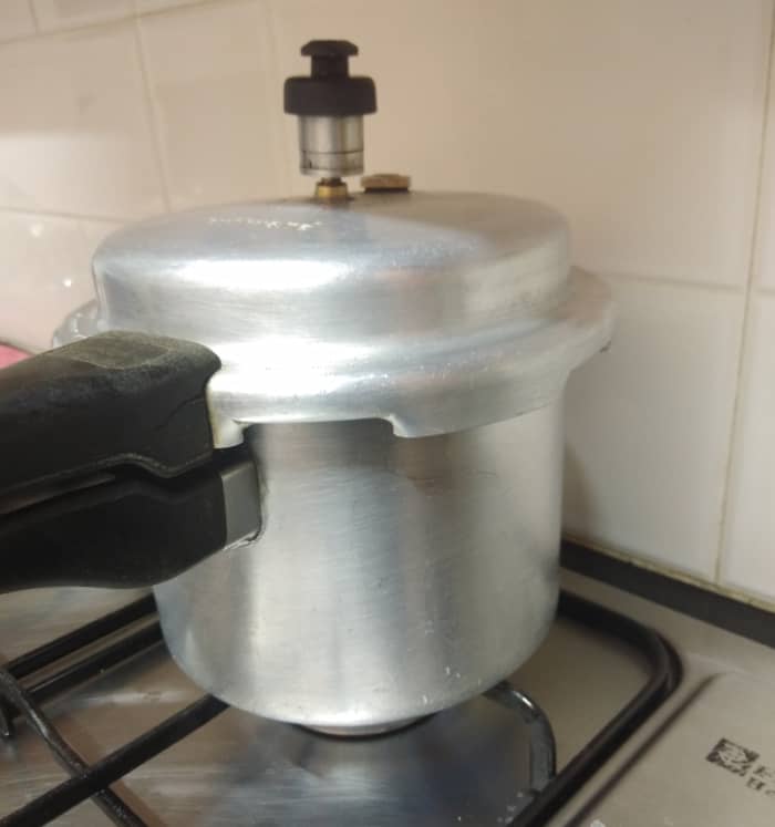 Take washed moong dal in pressure cooker. Add 3/4 cup of water. Close the lid and take 2-3 whistles on medium to high flame.