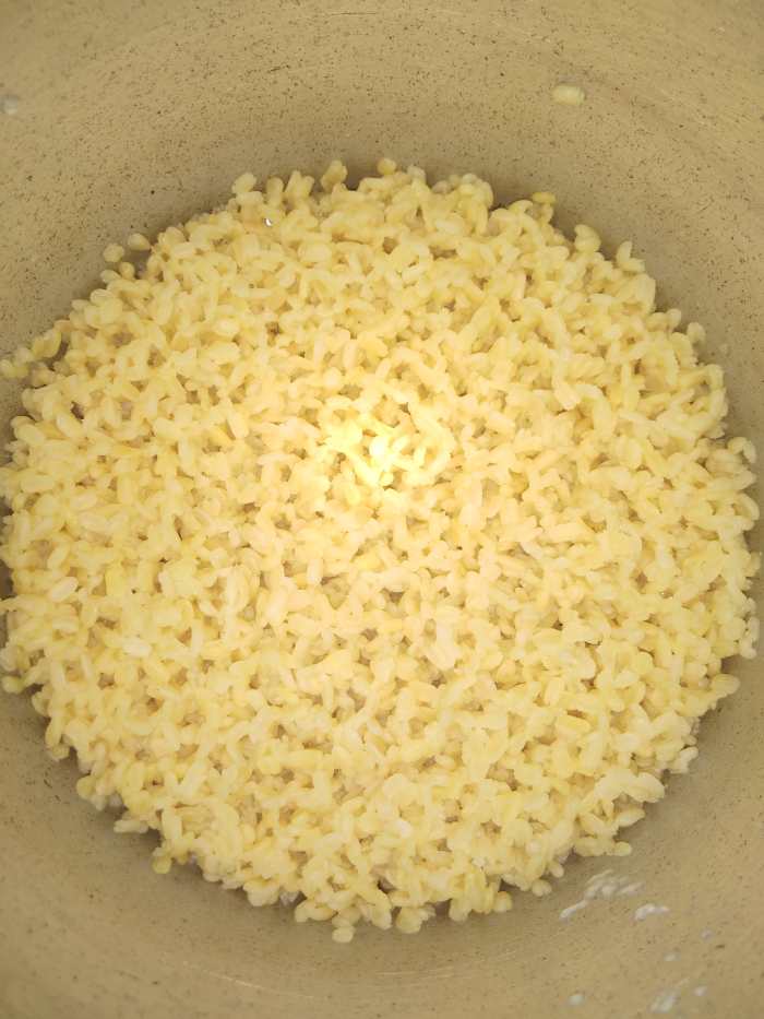 Let the pressure release by itself. Once the pressure settles down open the lid of pressure cooker and check if lentil is cooked properly. With the help of spoon or ladle mash the dal properly.