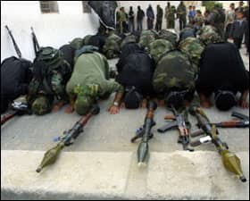 Praying amidst AK 47, Bazookas and military fatigue: religion as a means of spreading the war of ideas and ideas about the war- Issues of the Fatwa and Jihad