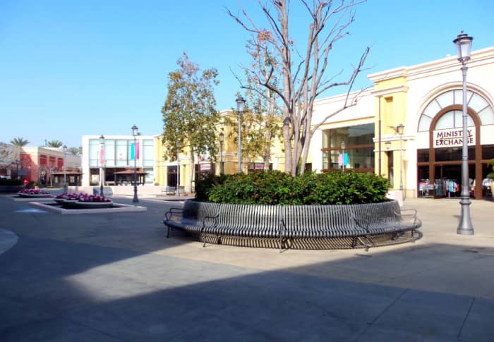 - "Shadow Encroachment" - A "Park Bench in the Round" along with a selection of specialty shops accentuate the quaint common area adjacent to the "Krikorian Movie Theater" - A perfect place to meet & engage friends, family members, & acquaintances -