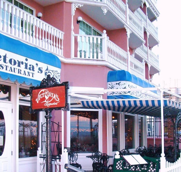 Victoria's Restaurant is part of the Boardwalk Plaza Hotel. This is a photo of the outdoor seating which is directly on the boardwalk. There is also a more formal dining room inside and oceanfront bar & lounge.