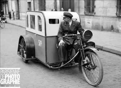 Electric powered taxicab. Paris 1941. Creativity is always at its highest level in times of crisis. Copyright LAPI/Roger-Viollet
