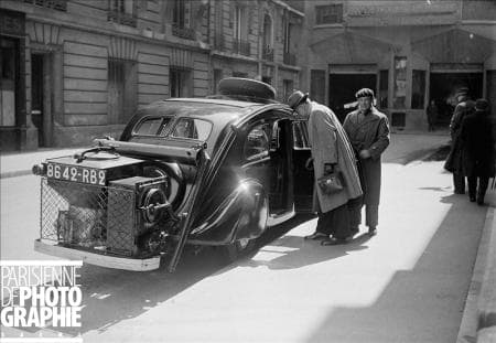 Paris, 1941. A Peugoet 402L or 602 converted to gas obtained by wood burning. Copyright LAPI/Roger-Viollet
