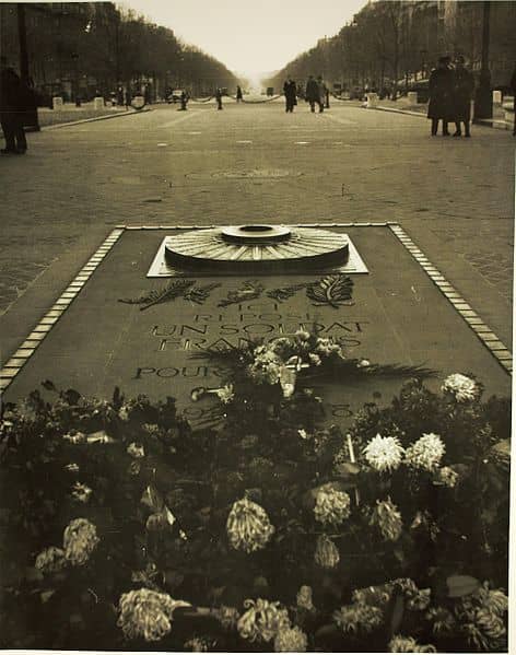 Unknown soldier tomb, located right under the Arc de Triomphe monument. This particular picture shows a perspective of the Avenue des Champs Elysees, all the way down to Place de la Concorde. C.1941