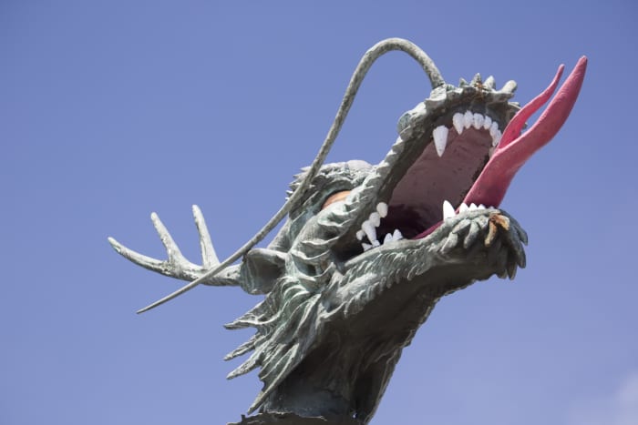 Essay topics might include symbolism in Beowulf, including the dragon.