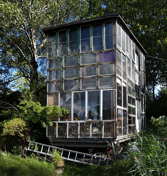 What does "those who live in glass houses should not throw stones" mean? Source: http://commons.wikimedia.org/wiki/File%3AChristiania%2C_glass_house%2C_august_2007.jpg