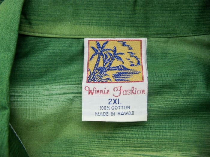 The outrigger in this print helps make this shirt a work of art. You can even see the pride in the shirt tag.