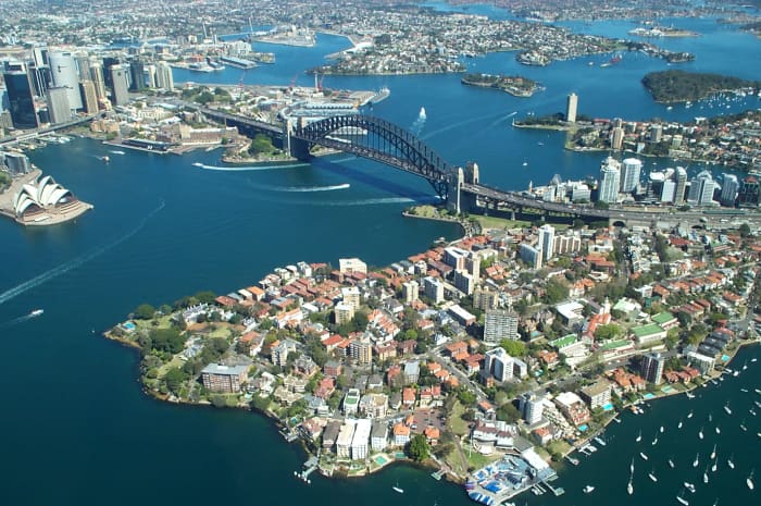 An image of the beautiful Sydney Harbour Bridge. It is located in Sydney, Australia's most populated and busy city.