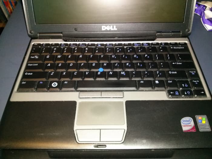 The Dell Latitude D430 after being wiped down with Clorox wipes on the palm rest, track pad and keyboard. The track pad still has some leftover finger oils on it that a Mr. Clean Magic Eraser can clean up pretty well.