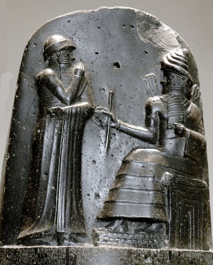 This relief on Hammurabi's Code of Law depicts Hammurabi receiving the divine right to rule from Shamash, the Mesopotamian Sun God.