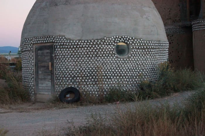 Earthship of Taos, New Mexico. Aluminum cans make a sturdy yet beautiful touch to an Earthship structure.