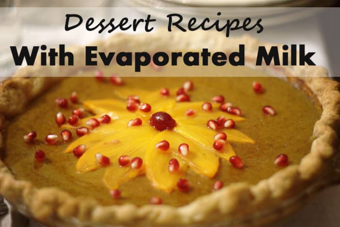 Pumpkin pie topped with persimmon slices and pomegranate seeds.