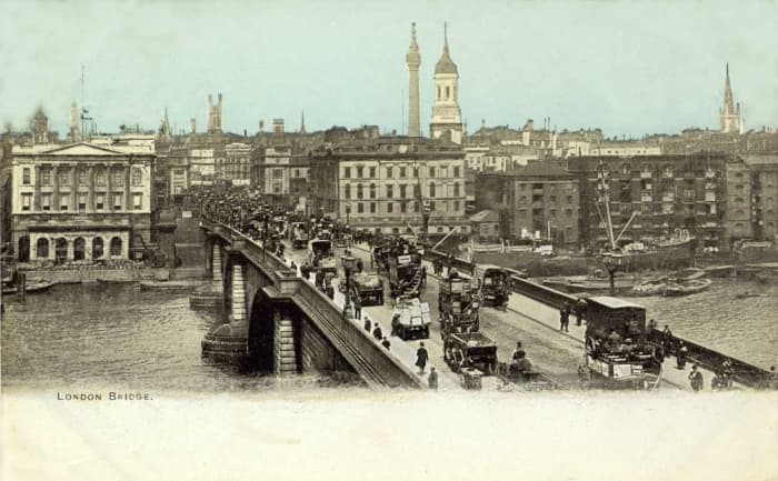 The bridge built in 1831 (William IV) and relocated in 1973 to Lake Havasu, Az (someone thought they'd bought Tower bridge?). Seen here looking from SE1 towards the City early 20th Century