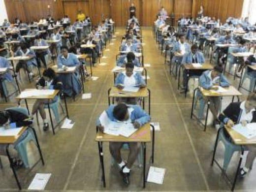 Pupils write English paper 1 at Gardens Commercial High School in Cape Town. The writer does not believe that the steadily improving matric pass rate is an "indication that the quality of education is improving". Source: Courtney Africa