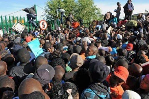 Parents and Students trying to enter to register their children in university. So rather than opening more seats at universities, This misperception the government is desperately trying to rectify. Scott Baldouf, reporting on the stampede