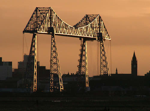 The Transporter Bridge stands near the Riverside Stadium and spans the Tees to Port Clarence on the County Durham shore (now Hartlepool Unitary Authority)