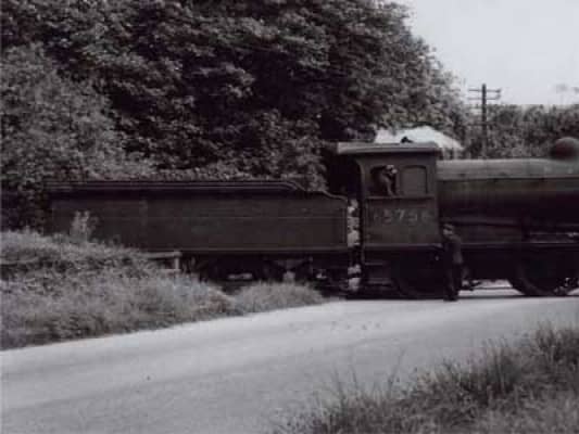 Class J26 0-6-0 65756 of Newport Shed (51B) shunts across Flatts Lane at Normanby Brickworks in the 1950s - a similar engine would take coal wagons to the Co-op depot at Eston