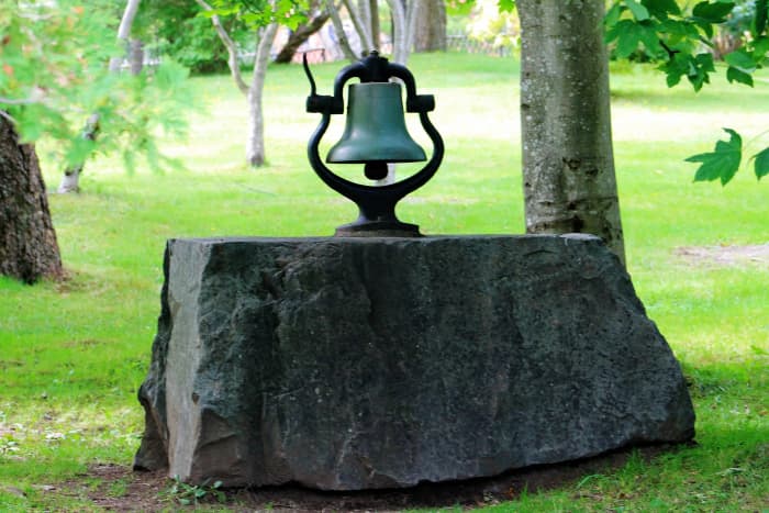The old bell, which, in years past, was wrung by the park superintendent to inform patrons that the park was closing.