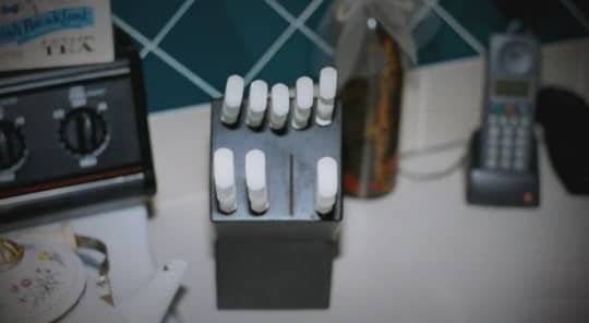 The knife block on the counter in the Routier kitchen. After cutting the screen in the garage window, Darlie put the knife back in the block. Smudged fingerprints were found on this knife.