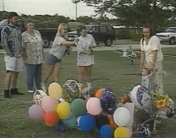 Although a private memorial service had taken place minutes earlier, images of Darlie smiling and laughing and spraying silly string on Devon's grave on his 7th birthday didn't sit well with observers. This was only 8 days after his brutal murder.