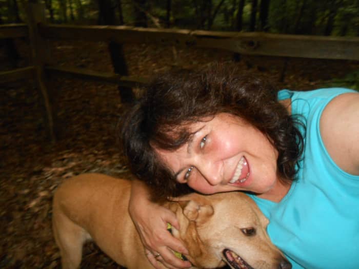 My personal trainer and I tired and sweaty but happy after a walk on a trail on a hot August day.