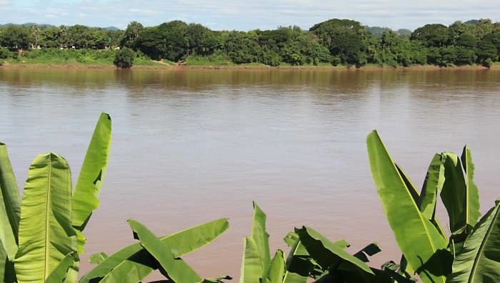 Looking out from the promenade across the Mekong to Laos - taken from the back of the guesthouse where the author spent a weekend