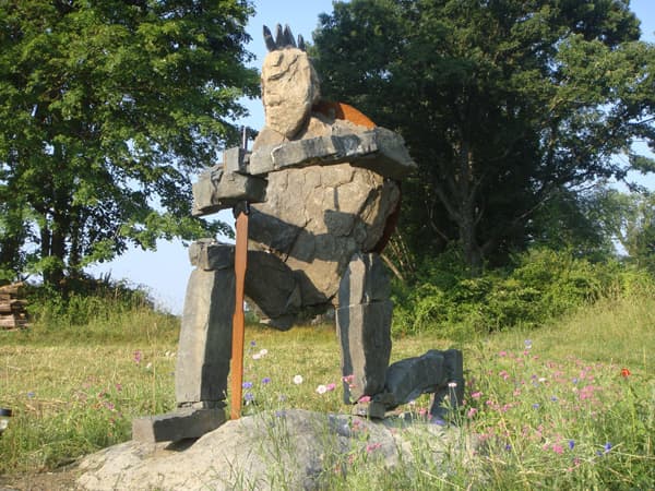 Jaskolka Sculptures interpretation of the Greek mythological warrior Achilles. Many of the stones used in the sculptures are from Legends Farm.
