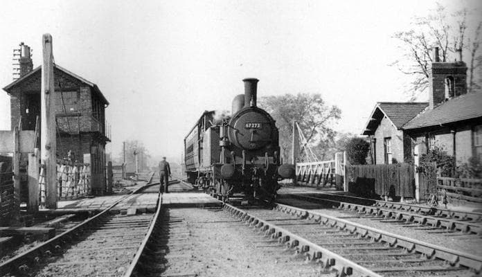 Mill Lane Junction, with Class G5 0-4-4 tank engine 67273 of Malton shed (50F) bound for Gilling before 1953. The crossing keeper's cottage on the right is still there, a short way from a pair of railwaymen's cottages (left behind photographer)