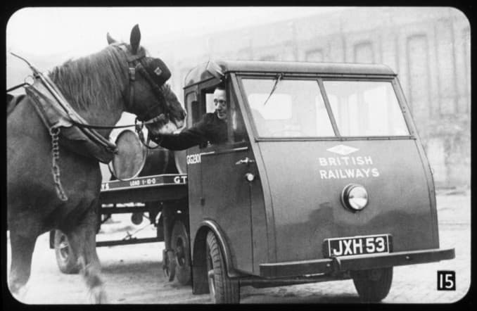 Four-legged horse meets mechanical horse - the driver greets the horse, possibly his charge before being transferred to the motor pool