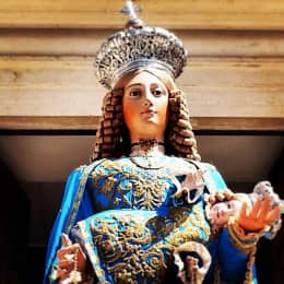 This is the statue of the Madonna of Genzano di Lucania, which is taken around the town in a procession. The feast lasts three days, all the town takes part at this religious feast in a way or another. So, the people have a good time.