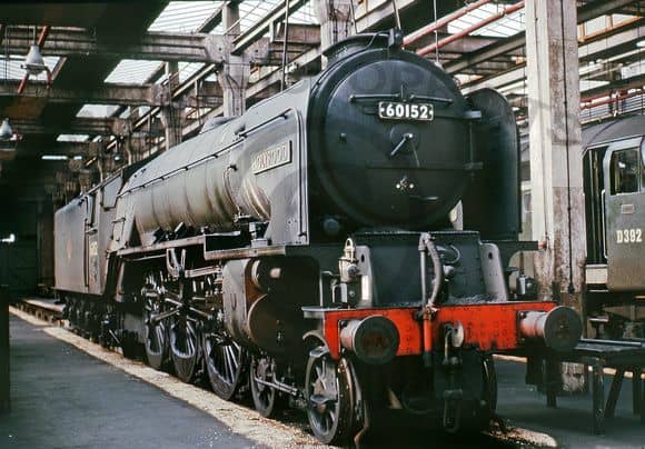 Seen here later in life with the late 1950s BR lozenge totem on her tender, 60152 'Holyrood' stands appropriately in one of the Scottish sheds with the sun streaming through the shed roof