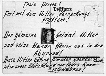 An example of the Hampfel's toxic postcards. Hitler's charming mug is obscured with the words worker-murderer.