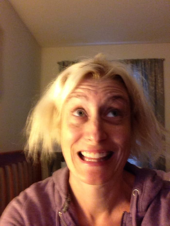 A recent photo of my over processed, fried hair. Daily blow drying plus straightening and chemical bleaching left my hair fried and falling out.