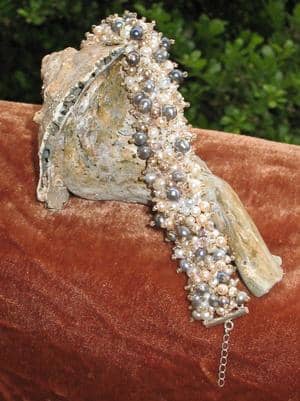 Peyote stitch bracelet embellished with freshwater pearls. These bracelets take hours to make but the end result is worth the labor.