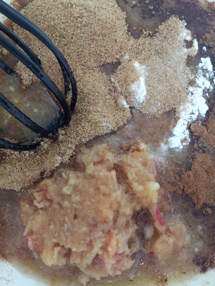 Combine and whisk together the grated apple, coconut sugar, baking soda, salt, and spices. The coconut sugar is low glycemic. The Celtic Sea Salt has 80+ minerals you won't find in other table salt, and a little goes a long way for flavour!